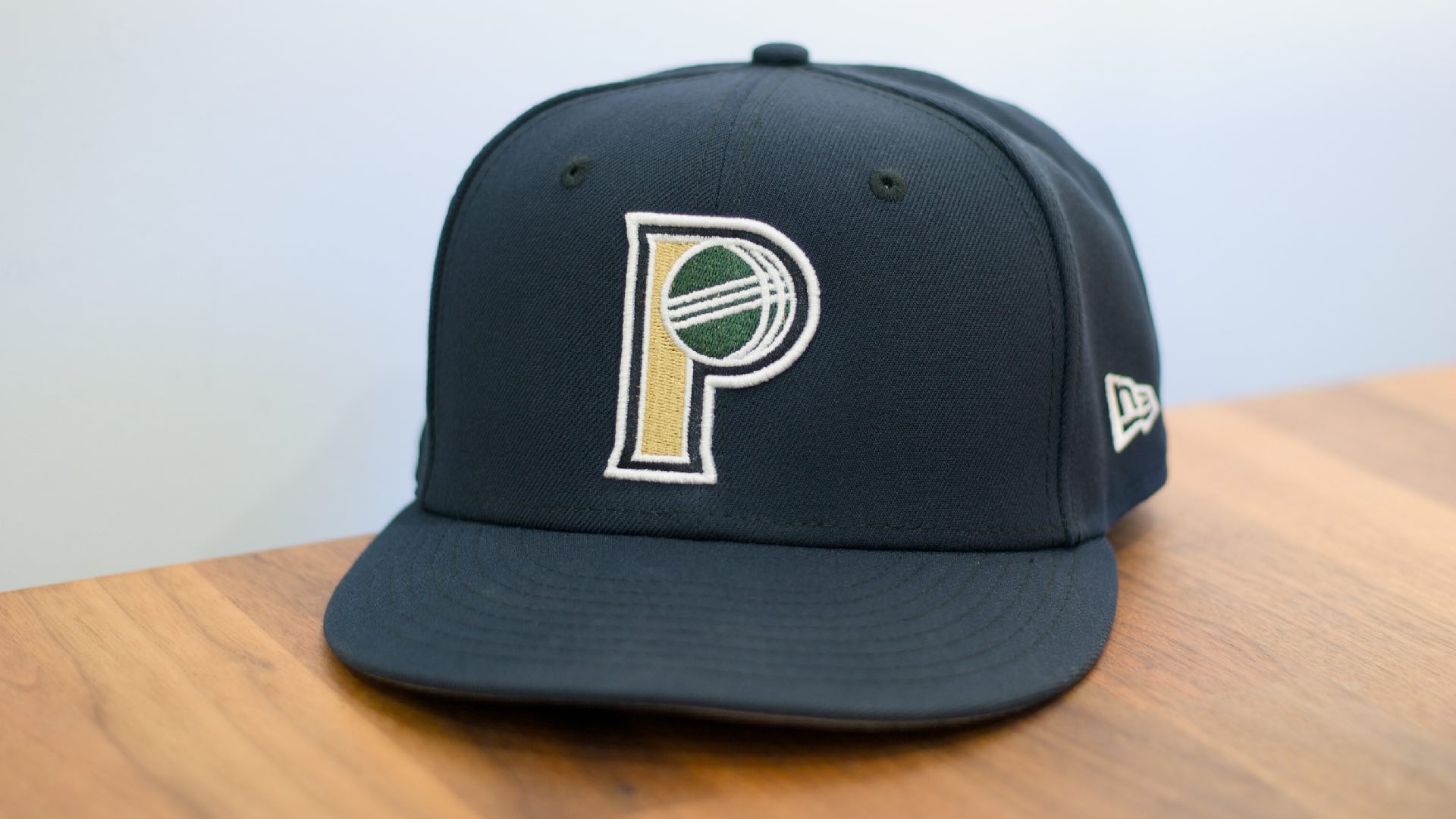 Progress Park Players bocce team logo on a cap